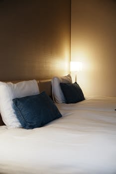 Minimal bedroom with white bedding